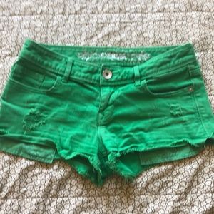 Express distressed green shorts